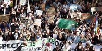 epa07856141 Protesters gather during a global climate strike demonstration in Paris, France, 20 September 2019. Millions of people around the world are taking part in protests demanding action on climate issues.  EPA-EFE/IAN LANGSDON