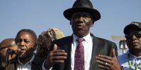 Police Minister Bheki Cele addressed Jeppestown residents at a park near the Jeppestown police station in Johannesburg on 3 September 2019 following days of public violence. Photo: Daily Maverick/Greg Nicolson