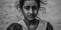 A portrait of a child working in a paddy field. She works alongside her parents as it allows her to continue her studies. Her passion was inspiring.© Sabbir Hossen, Bangladesh, Winner, National Awards, 2021 Sony World Photography Awards