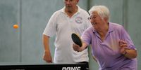 Elderly people play table tennis August 25, 2005 in Berlin, Germany. Germany's economy and pension system is being burdened by an expanding elderly population, and German politicians are offering various solutions ahead of the elections on September 18, 2005.  (Photo by Andreas Rentz/Getty Images)