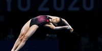 epa09395147 Hongchan Quan of China performs in the Women's 10m Platform Diving Preliminary during the Diving events of the Tokyo 2020 Olympic Games at the Tokyo Aquatics Centre in Tokyo, Japan, 04 August 2021.  EPA-EFE/PATRICK B. KRAEMER