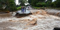 Part of Caversham Road in Pinetown, Durban, was washed away on 12 April 2022 after persistent heavy rain in parts of KwaZulu-Natal resulted in widespread flooding, collapsing roads and death. (Photo: Gallo Images / Darren Stewart)