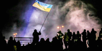 Ukrainian flag flies. Production still from "Winter On Fire: Ukraine’s Fight For Freedom." Image:  courtesy of Netflix