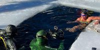 Divers get ready to accompany Cape Town woman Amber Fillary on her world-record beating swim under thick ice in one-degree water in a lake in southern Norway. Image: Supplied