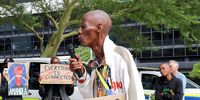 Petrus Moshe, from the Catholic Justice and Peace Commission in Klerksdorp near Stilfontein, addresses the crowd at a Stilfontein solidarity picket on 5 February 2025 the Cape Town International Convention Centre during the Mining Indaba. (Photo: Kristin Engel)