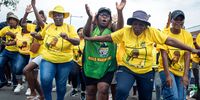 DURBAN, SOUTH AFRICA - FEBRUARI 24: African National Congress (ANC) supporters sing and dance before the ANC Election Manifesto at Moses Mabhida Stadium on February 24, 2024, in Durban, South Africa. About 70,000 people gathered to hear ANC President Cyril Ramaphosa state the promises in advance of the election which will be held on May 29, 2024. Mr. Ramapahosa promised to step up his governments efforts to create jobs, welfare grants and a national health care program. ANC has seen decreased support in recent polls and especially KwaZulu-Natal province will be a tightly contested province during 2024 elections, Thirty years after the first democratic elections on April 27, 1994. (Photo by Per-Anders Pettersson/Getty Images)