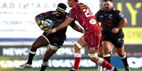 Siya Kolisi of Cell C Sharks is tackled by Aaron Shingler of Scarlets during the United Rugby Championship match between Scarlets and Cell C Sharks at Parc y Scarlets on 25 March 2023 in Llanelli, Wales. (Photo: Ben Evans / Huw Evans / Gallo Images)