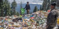 People searches for valuable items from a heap of garbage dumped in the Meadow of flowers on May 15, 2023 in Gulmarg, west of Srinagar, Indian administered Kashmir, India. Gulmarg, also known as the "Meadow of Flowers," is home to the world's highest golf course and a gondola lift that reaches elevations exceeding 4,000 meters. Ski enthusiasts flock to this mountainous region during the winter months to take advantage of the powdery snow. In the summer, however, the resort is flooded with tourists in search of clean, refreshing air due to India's soaring temperatures. Many of these visitors leave behind a significant amount of waste, causing severe ecological threats and endangering villagers who rely on the glacial waters. The accumulation of trash poses a grave danger to the delicate alpine ecology, as well as to the communities that depend on the glacier-fed streams for their water supply. There are no restrictions on bringing food and water up the mountain, despite signs along the road reminding people that plastic is prohibited. Environmental activists caution that all the waste generated in Gulmarg and its surrounding areas is being indiscriminately discarded in the mountains. (Photo by Yawar Nazir/Getty Images)
