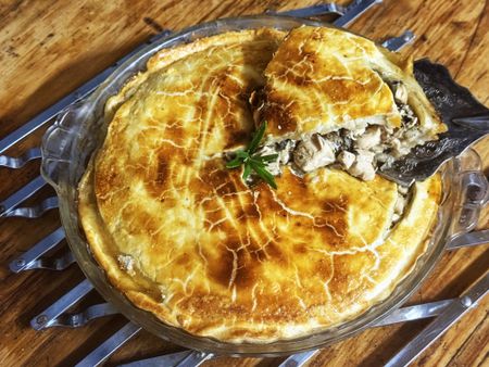 A family-size chicken and mushroom pie