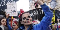 Les Rosies Group, wearing headband of Rosie the Rieveter, demonstrate against the planned pension reform, in Paris, France, 07 February 2023. The French government plans to raise the minimum retirement age from 62 to 64 by 2030.  EPA-EFE/TERESA SUAREZ