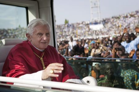 Voodoo, snakes, condoms and the Pope's new African reality