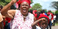 Hlengiwe Dlamini (58), from Folweni south of Durban, with her grandson Qiniso Dlamini at the rally on Saturday. (Photo: Phumlani Thabethe)