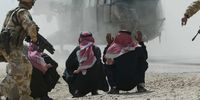 British army Gurkhas take Iraqi men for questioning near Basra, April 2003. (Photo: EPA-MOD pool / James Vellacott)