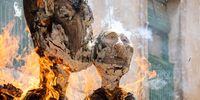 A mock puppet resembling Russian President Vladimir Putin (R) is set on fire during the traditional 'Burning of the Judas' event on Easter Sunday at the town of Alfaro, La Rioja region, northern Spain, 09 April 2023. The event consist of the burning of some dolls distributed by the municipality that mainly represent politicians or celebrities, to leave behind the bad things they have done during the year and to 'resurrect' in the next 365 days.  EPA-EFE/RAQUEL MANZANARES