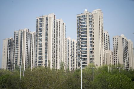 Coupon Payment Made; China Downplays Risk: Evergrande Update