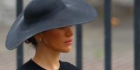 LONDON, ENGLAND - SEPTEMBER 19: Meghan, Duchess of Sussex arrives for the State Funeral of Queen Elizabeth II at Westminster Abbey on September 19, 2022 in London, England.  Elizabeth Alexandra Mary Windsor was born in Bruton Street, Mayfair, London on 21 April 1926. She married Prince Philip in 1947 and ascended the throne of the United Kingdom and Commonwealth on 6 February 1952 after the death of her Father, King George VI. Queen Elizabeth II died at Balmoral Castle in Scotland on September 8, 2022, and is succeeded by her eldest son, King Charles III. (Photo: Hannah McKay - WPA Pool / Getty Images)