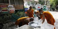 Thai Buddhist monks sort recyclable plastic bottles at Wat Chak Daeng temple in Samut Prakan province, Thailand, 29 May 2023. Issued 01 June 2023 At What Chak Daeng temple, Thai Buddhist monks have set up a cooperative between the temple and community members to recycle used polyethylene terephthalate (PET) plastic bottles and transform them into saffron robes. The World will mark the 2023 Environment Day on 05 June with a  focus on "solutions to plastic pollution".</p>
<p>While worshippers in other temples usually donate food and daily necessities as alms, here they are encouraged to collect and bring in used or discarded plastic bottles. The monks then sort them accordingly from the non-recyclable trash. Workers help to crunch and press them into portable bales to be transported to factories where they are shredded into flakes, manufactured into polyester fibres, spun into yarns and then weaved and dyed into saffron coloured fabrics. The recycled cloth is then returned to the temple where volunteers cut and sew them into new saffron robes for the monks. About 60 1.5 litre plastic bottles can be converted to one set of robes for the monks. The temple usually receives donations of about 10 tons of plastic bottles per month.</p>
<p>Thailand is one of the world's largest plastic polluters with more than two millions tons of plastic waste generated each year. The Thai government announced in February 2023 that it will completely ban the import of all plastic waste effective from 1st January 2025.  EPA-EFE/NARONG SANGNAK  ATTENTION: This Image is part of a PHOTO SET