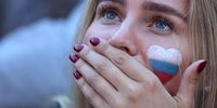 A Russian fan reacts in the Fan Fest area in St Petersburg, Russia 25 June 2018, watching the FIFA World Cup 2018 group A game between Russia and Uruguay.  EPA-EFE/TOLGA BOZOGLU