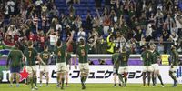 South African players celebrate with supporters after winning the Rugby World Cup 2019 semi final match between South Africa and Wales at the International Stadium Yokohama in Yokohama City, Japan, 27 October 2019.  EPA-EFE/FRANCK ROBICHON 
