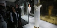 People watch the costumes that were used by Princess Diana at the inauguration of the exhibition in memory of Diana of Wales  'Remembering Diana (1961-1997)', in Santiago, Chile, 31 August 2017. Twenty years after the accident that cost Princess Diana's life in Paris, the Chilean Fashion Museum narrates with 10 iconic dresses the princess's story in an exhibition that shows only a part of the largest private collection of her costumes that exist in the world.  EPA-EFE/ELVIS GONZALEZ