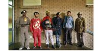 The Party
Soweto, 1990
Supporters of the South African Communist Party pose in various homemade Party apparels, at the football stadium outside Soweto, where its first public meeting was held after they had been banned for decades. Many of the participants were still nervous of being seen to be publicly supporting the Party. Photo Greg Marinovich