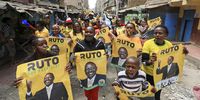 Supporters of the Kenya Kwanza Coalition shout slogans and hold banners as they celebrate the Supreme Court rulling, in Mathare area 4, in Nairobi, Kenya, 05 September 2022. (Photo: EPA-EFE / Daniel Irungu)