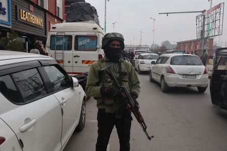 India suspends policeman for firing AK-47 at student protesters
