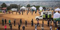 Some of the thousands of residents who waited in a queue to be tested during a local government mass Covid-19 testing deployment on 27 April in Alexandra township, Johannesburg on day 32 of the national lockdown. (Photo: EPA-EFE / Kim Ludbrook)
