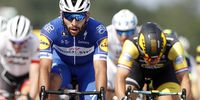 Quick Step Floors rider Fernando Gaviria of Colombia celebrates as he crosses the finish line to win the 4th stage of the 105th edition of the Tour de France cycling race over 195km between La Baule and Sarzeau, France, 10 July 2018.  EPA-EFE/SEBASTIEN NOGIER