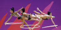 Team USA gymnasts compete in the five-ring rhythmic gymnastics category at the 2025 ASU Junior Pan American Games in Asuncion, Paraguay, 13 August 2025.  EPA/Juan Pablo Pino