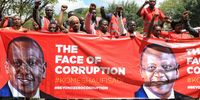 epa07537962 Kenyan activists from a civil rights group who call themselves the Red Vest Movement, shout slogans as they hold a banner with a collaged image of Kenyan President Uhuru Kenyatta and his deputy William Ruto that they say represents the corruption in the country, during a march to protest against corruption, in central Nairobi, Kenya, 30 April 2019. Kenyan police fired tear gas at anti-corruption protesters who were demanding President Kenyatta to act on corruption or resign.  EPA-EFE/Daniel Irungu