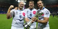 Jannie Du Plessis, Francois Steyn and Bismarck Du Plessis of Montpellier celebrate with the trophy following their team's 26-19 victory during the European Rugby Challenge Cup final against Harlequins at the Grand Stade de Lyon on May 13, 2016 in Lyon, France. (Photo: David Rogers/Getty Images)