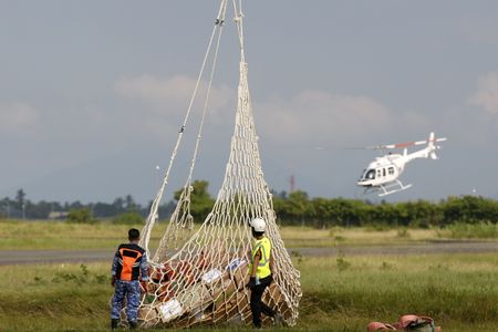 Indonesian military steps up relief efforts for flood-hit Sumatra; death toll above 860
