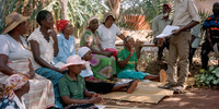 The academy's training is conducted by AAA agronomists and farmer trainers, such as Tafadzwa Nyakuchena, who looks after the Mutasa district. He also provides on-site advice during door-to-door visits in the communities to encourage the adoption of recommended best practices. Image by Rena Effendi for National Geographic