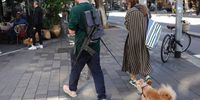 A man carries an assault rifle Dizengoff Street in Tel Aviv, Israel. 19 January 2024 (issued 28 January 2024). Since the 07 October 2023 Hamas attacks, the Israel Defense Forces (IDF) has recruited more than 300,000 reservists soldiers, while over 260,000 new applications for weapons licenses have been submitted to the Ministry of Internal Security office, the minister of national security said. The events of October 2023 had a huge impact on Israeli citizens and their sense of personal security.  EPA-EFE/ABIR SULTAN  ATTENTION: This Image is part of a PHOTO SET