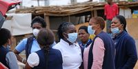 Health workers outside a testing station in Alexandra township on March 31, 2020 in Johannesburg, South Africa. Under pressure from a global pandemic. President Ramaphosa declared a 21 day national lockdown, mobilising goverment structures accross the nation to combat the rapidly spreading COVID-19 virus, or Coronavirus. The lockdown requires businesses to close and the public to stay at home during this period, unless part of approved essential services.(Photo by Gallo Images/ Dino Lloyd)