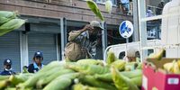 Members of the South African Police Service confiscate goods from illigal street traders during the coronovirus lockdown, Hillbrow, Johannesburg, South Africa, 21 April 2020