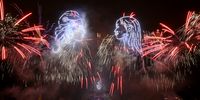 A drone and firework show lights up the Eiffel Tower on July 14, 2025 in Paris, France. The fireworks will be accompanied by a thousand drones highlighting the river Seine during the Bastille Day celebrations. The spectacle is also commemorating the 10 year anniversary of the Paris Agreement with Brazil, which the France capital will celebrate for six months in 2025 during the Brazil-France Season.  (Photo by Kristy Sparow/Getty Images)